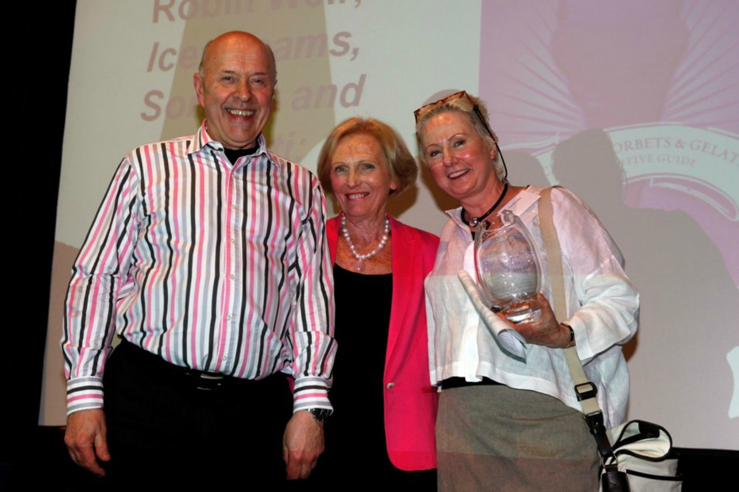 Caroline and Robin Weir receiving their award from Mary Berry